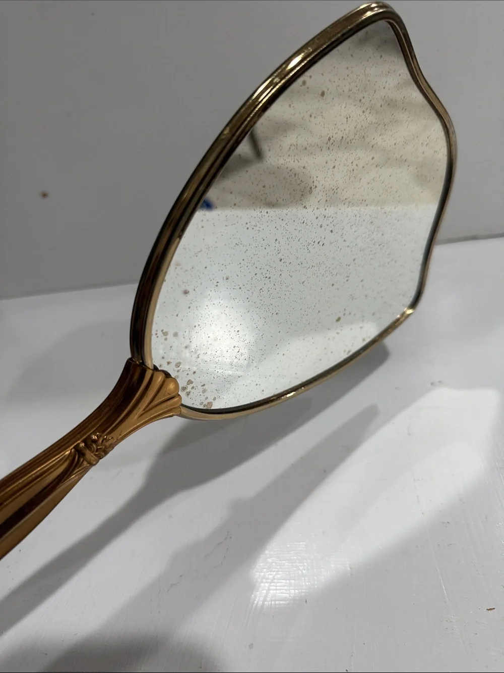 Mid Century Hollywood Regency Hand Held Mirror with Floral Detail 1950’s